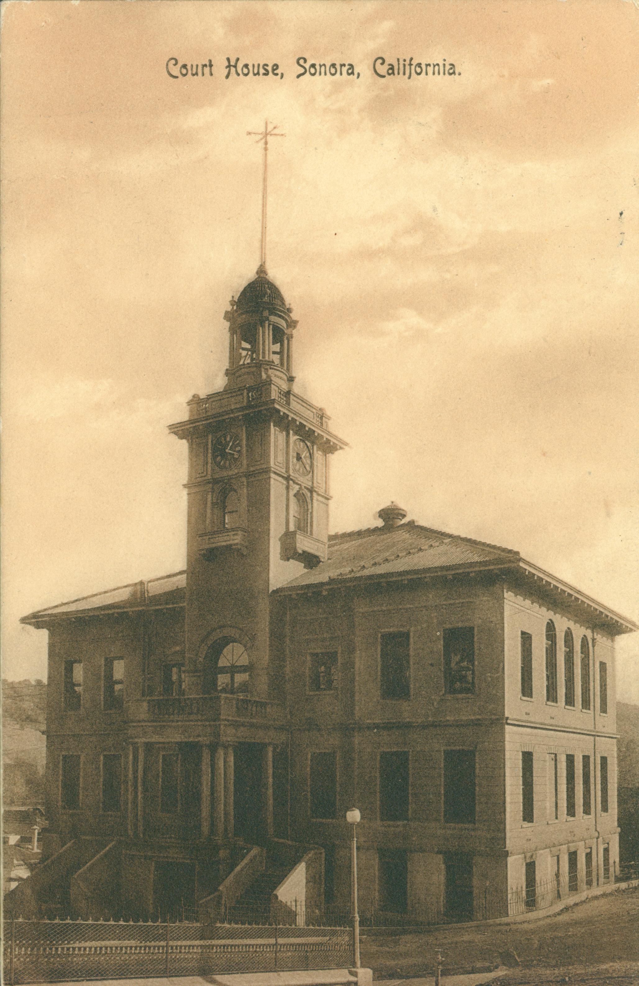 Shows a front corner view of the courthouse in Sonora